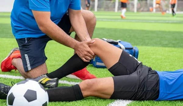a physio treating sports injury